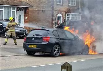 Woman pulled from car blaze near leisure centre