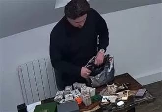 'Dirty cash, I want you!' Singing drug dealer caught on his own CCTV