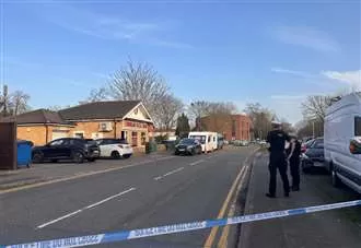 Police cordon put up as armed officers descend on takeaway
