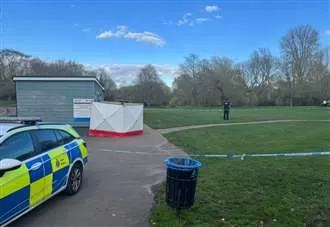 Police stand guard at park as toilet block cordoned off