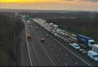 Huge queues on major route after crash sparks gridlock