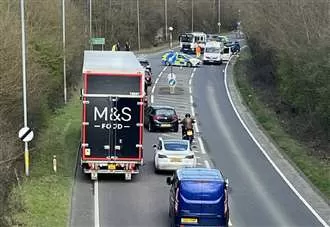 Road blocked in both directions as emergency crews called to three-car crash