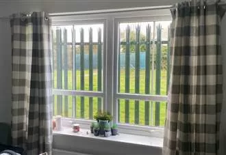 Council finds no planning breach in ‘prison style’ fencing at new-build scheme
