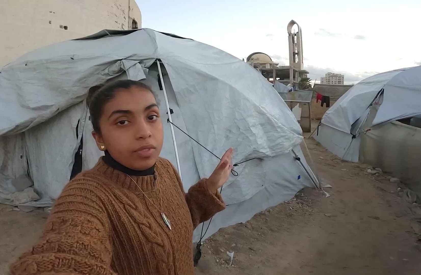 ‘Let me show you’: Survivors cling to life in Gaza’s tent cities