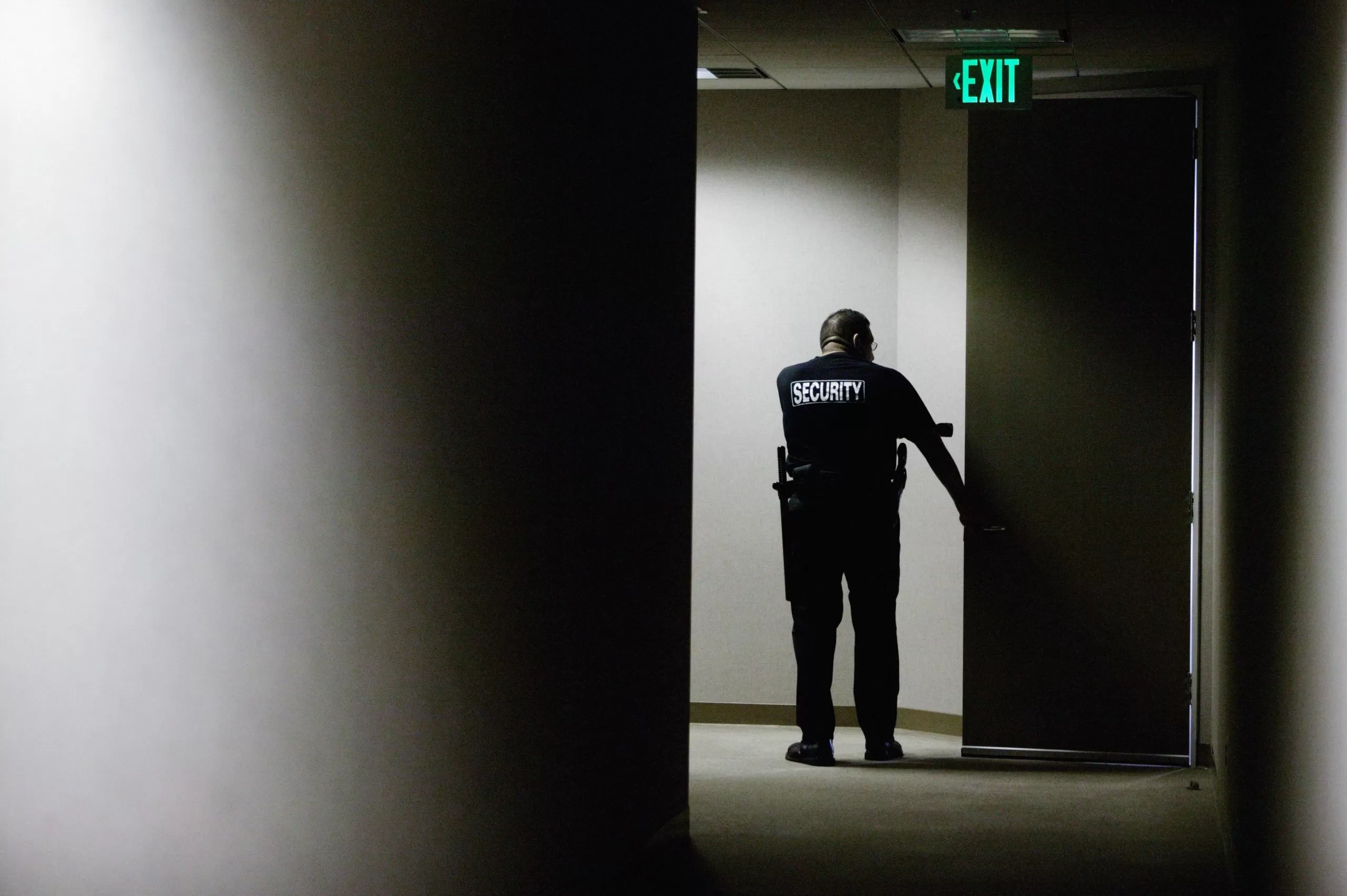 Underpaid, uninsured, held at gunpoint: Baltimore security guards strike for a union