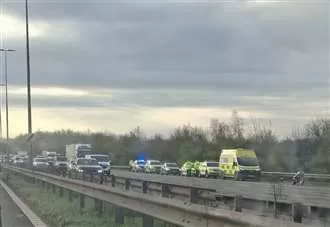 Long delays after car and motorbike crash on A2